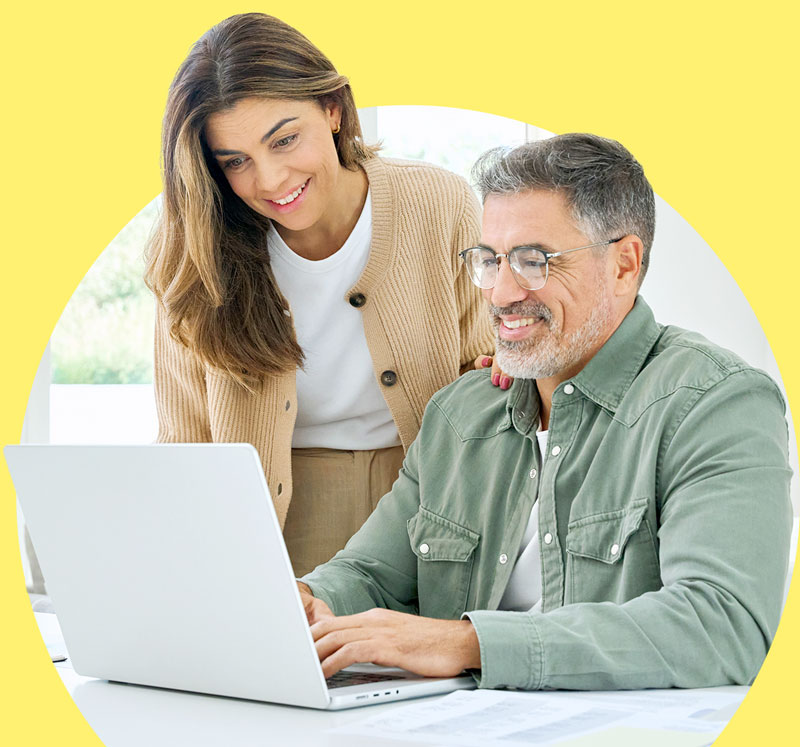 Couple using laptop